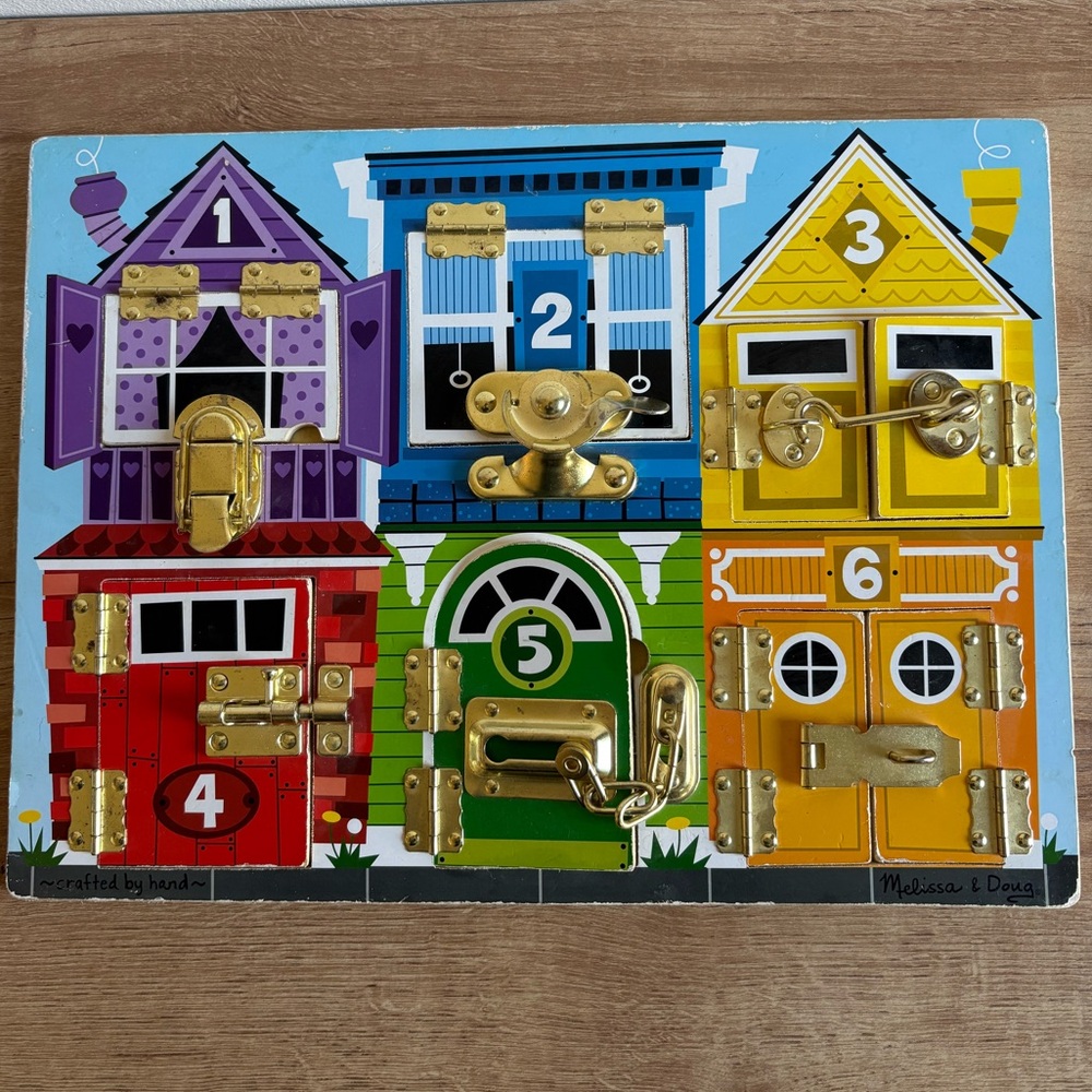 Melissa & Doug Latches Board